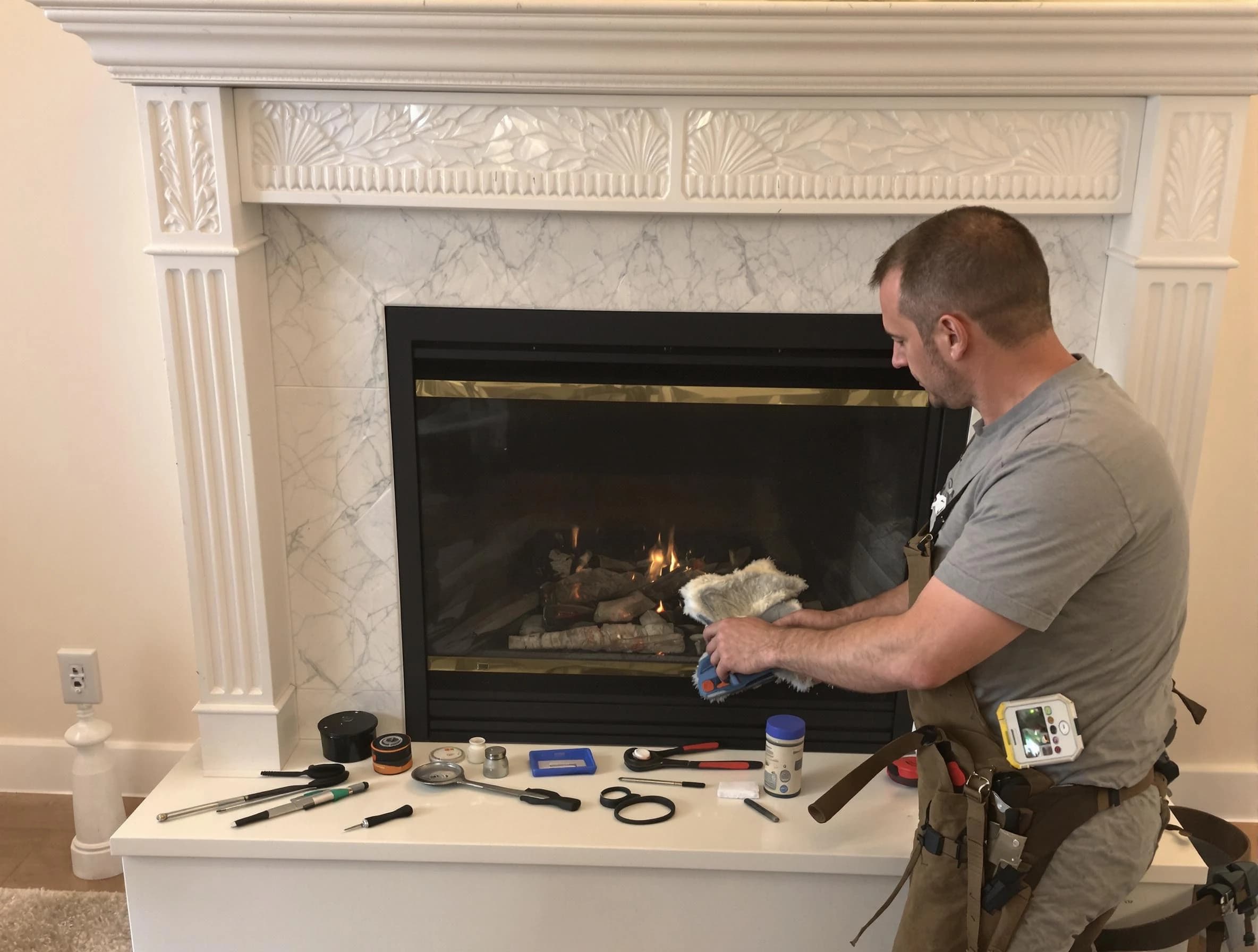 Jersey City Chimney Sweep performing fireplace maintenance in Jersey City, NJ